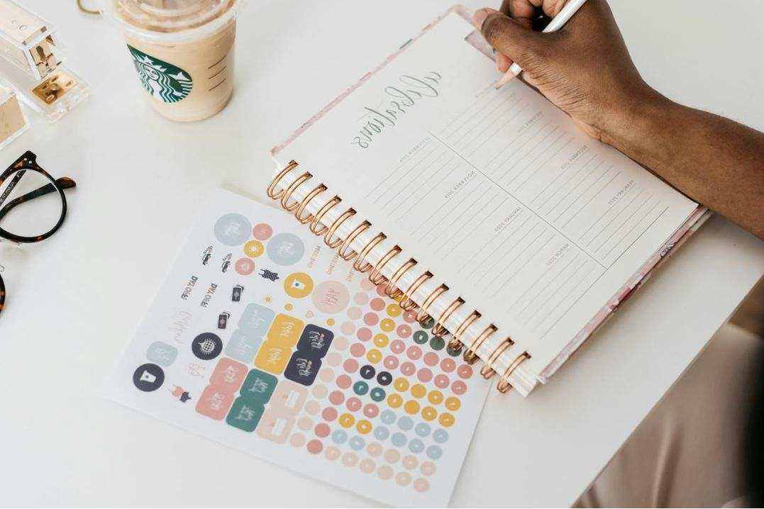 Open notebook with pen